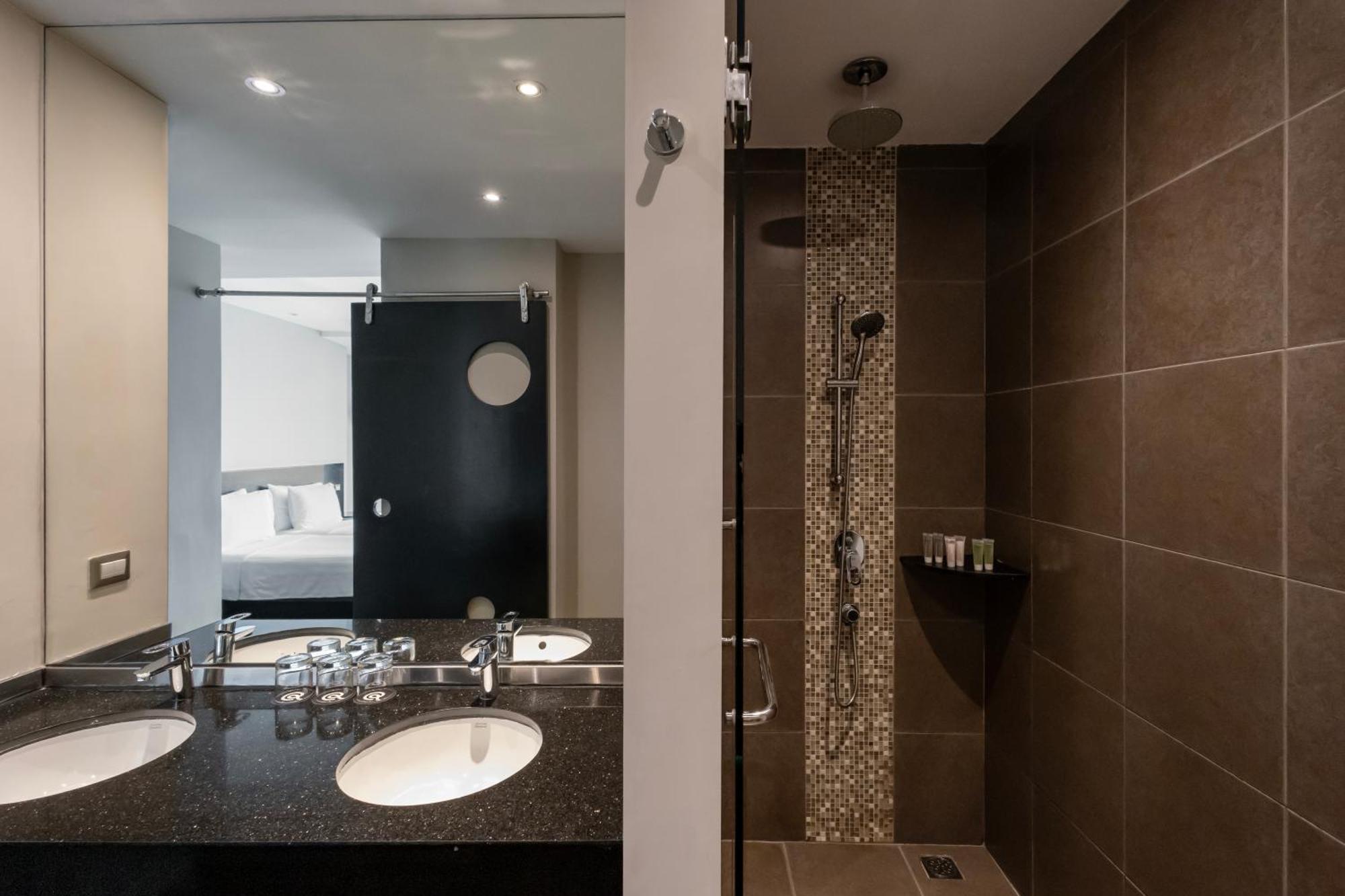 Habitación triple Deluxe con 3 camas individuales